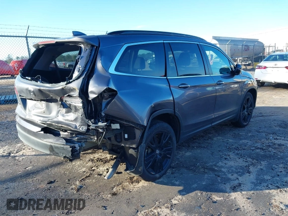 2022 Honda Pilot Special Edition with VIN 5FNYF5H26NB014269, listed as a IAAI auction lot 41239868 with 51,005 mi miles and . Bid and sale history available at carsss.com. Image 4.