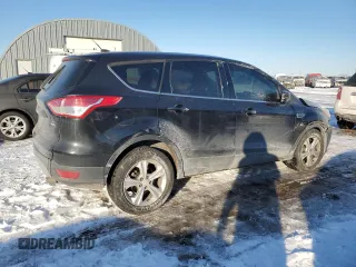 2014 Ford Escape SE z VIN 1FMCU9G95EUA94916, wystawiony jako Copart lot #41660525 z przebiegiem 146 941 mil mil oraz Szkoda całkowita • Salvage title. Historia ofert i sprzedaży dostępna na DreamBid. Obrazek 3.