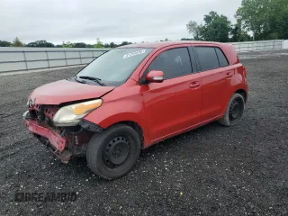 2010 Scion xD with VIN JTKKU4B44AJ052093, listed as a Copart auction lot 61249695 with Not provided miles and Salvage title. Bid and sale history available at DreamBid. Image 1.