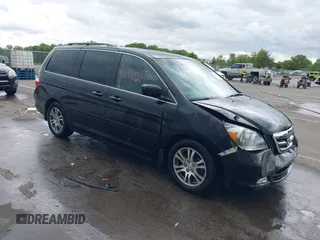 2007 Honda Odyssey Touring z VIN 5FNRL38897B052538, wystawiony jako IAAI lot #42330214 z przebiegiem 173 535 mil mil oraz . Historia ofert i sprzedaży dostępna na DreamBid. Obrazek 1.