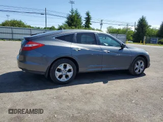 2012 Honda Crosstour EX-L z VIN 5J6TF2H53CL009635, wystawiony jako Copart lot #56073575 z przebiegiem 193 434 mil mil oraz Szkody całkowita. Historia ofert i sprzedaży dostępna na DreamBid. Obrazek 3.