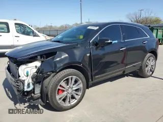 2024 Cadillac XT5 FWD Premium Luxury z VIN 1GYKNCR4XRZ705392, wystawiony jako Copart lot #49045405 z przebiegiem 6 005 mil mil oraz Szkoda całkowita • Salvage title. Historia ofert i sprzedaży dostępna na DreamBid. Obrazek 1.