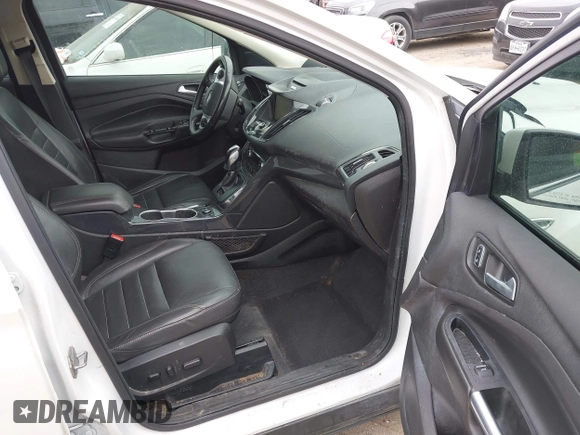 2015 Ford Escape Titanium with VIN 1FMCU0J98FUC07537, listed as a IAAI auction lot 41440462 with 233,924 mi miles. Bid and sale history available at carsss.com. Image 5.