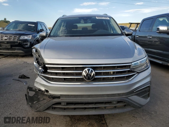 2023 Volkswagen Tiguan S with VIN 3VVFB7AX0PM086699, listed as a Copart auction lot 62885184 with 5,694 mi miles and Salvage title. Bid and sale history available at DreamBid. Image 5.