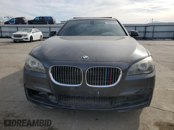 2012 BMW 7 Series 750i with VIN WBAKA8C58CDS99694, listed as a Copart auction lot 46828435 with 131,458 mi miles and Salvage title. Bid and sale history available at DreamBid. Image 5.