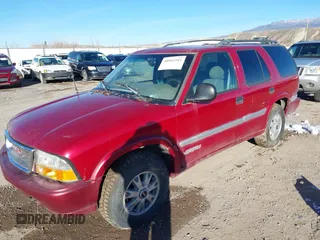 1998 GMC Jimmy SLT with VIN 1GKDT13W3W2539146, listed as a IAAI auction lot 40981941 with 1 mi miles. Bid and sale history available at carsss.com. Image 2.