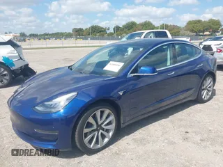 2020 Tesla Model 3 Standard Range Plus z VIN 5YJ3E1EA6LF785622, wystawiony jako IAAI lot #42080180 z przebiegiem 34 133 mil mil oraz . Historia ofert i sprzedaży dostępna na DreamBid. Obrazek 17.