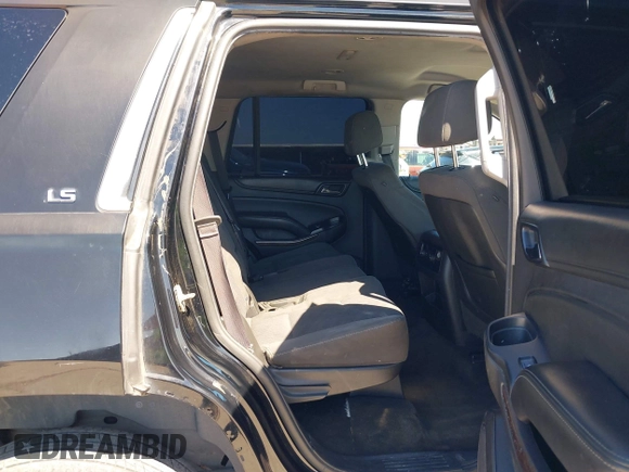 2015 Chevrolet Tahoe LS with VIN 1GNSCAKC5FR645736, listed as a IAAI auction lot 42064623 with 223,149 mi miles and . Bid and sale history available at DreamBid. Image 8.