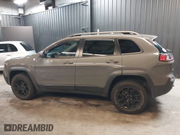 2019 Jeep Cherokee Trailhawk Elite with VIN 1C4PJMBX8KD458989, listed as a IAAI auction lot 41881517 with 89,045 mi miles. Bid and sale history available at carsss.com. Image 14.