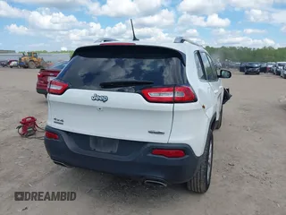 2015 Jeep Cherokee Latitude z VIN 1C4PJMCS3FW557734, wystawiony jako IAAI lot #42273937 z przebiegiem 168 828 mil mil oraz . Historia ofert i sprzedaży dostępna na DreamBid. Obrazek 4.