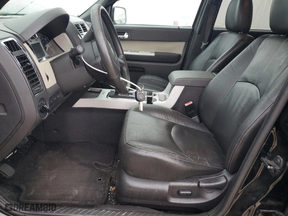 2009 Mercury Mariner Premier with VIN 4M2CU87GX9KJ24193, listed as a Copart auction lot 78528814 with 157,462 mi miles and Clean Title. Bid and sale history available at carsss.com. Image 7.