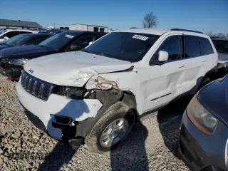2017 Jeep Grand Cherokee Laredo with VIN 1C4RJFAG0HC694010, listed as a Copart auction lot 88891215 with 8,450 mi miles and Salvage title. Bid and sale history available at DreamBid. Image 1.