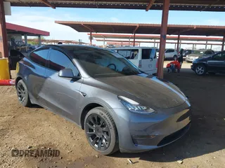 2022 Tesla Model Y Long Range with VIN 7SAYGDEE2NA017434, listed as a IAAI auction lot 41842025 with 35,164 mi miles and . Bid and sale history available at DreamBid. Image 1.