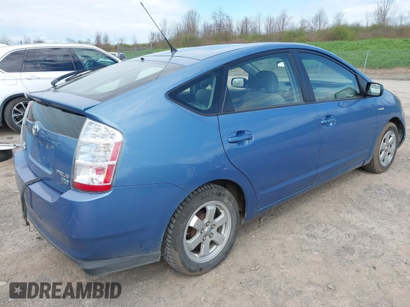 2007 Toyota Prius with VIN JTDKB20U677586433, listed as a IAAI auction lot 42163815 with 105,343 mi miles and . Bid and sale history available at DreamBid. Image 4.