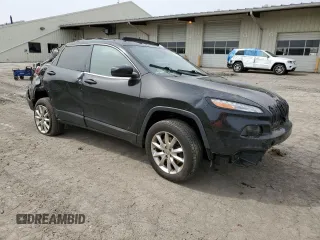 2014 Jeep Cherokee Limited with VIN 1C4PJMDS9EW210955, listed as a Copart auction lot 53263085 with 92,927 mi miles and Salvage Title. Bid and sale history available at DreamBid. Image 4.