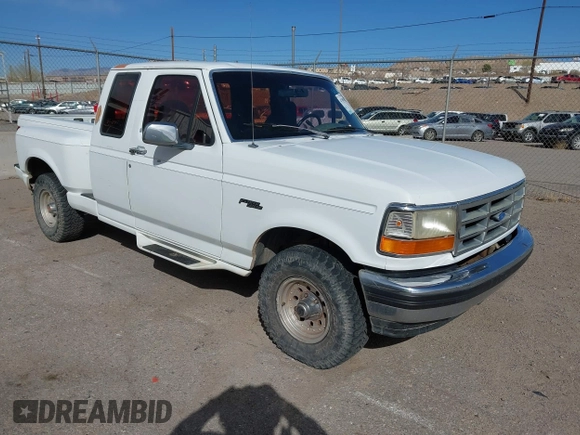 1993 Ford F-150 z VIN 1FTEX14H5PKA70504, wystawiony jako IAAI lot #41700760 z przebiegiem 208 794 mil mil oraz . Historia ofert i sprzedaży dostępna na DreamBid. Obrazek 1.