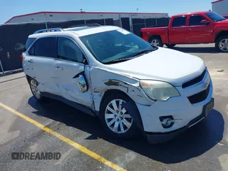 2011 Chevrolet Equinox 2LT z VIN 2CNFLPE50B6394569, wystawiony jako IAAI lot #42008653 z przebiegiem 238 617 mil mil oraz . Historia ofert i sprzedaży dostępna na DreamBid. Obrazek 1.