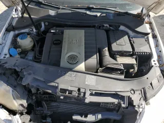 2008 Volkswagen Passat Turbo z VIN WVWJK73C58E186808, wystawiony jako Copart lot #72097784 z przebiegiem 131 500 mil mil oraz Szkoda całkowita • Salvage title. Historia ofert i sprzedaży dostępna na DreamBid. Obrazek 11.
