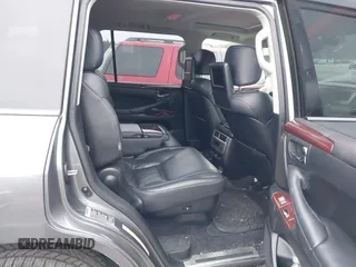 2014 Lexus LX 570 with VIN JTJHY7AX6E4137344, listed as a IAAI auction lot 41260948 with 108,777 mi miles and . Bid and sale history available at DreamBid. Image 8.