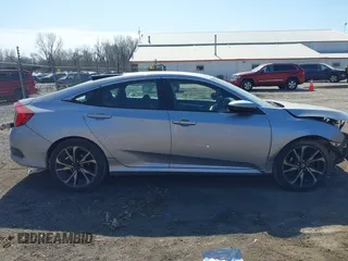 2021 Honda Civic Sport with VIN 2HGFC2F83MH540939, listed as a IAAI auction lot 41789508 with 100,274 mi miles and . Bid and sale history available at DreamBid. Image 14.