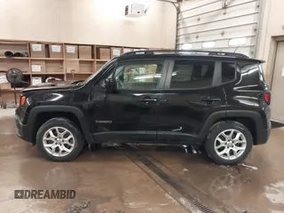 2015 Jeep Renegade Latitude with VIN ZACCJBBT0FPB52572, listed as a IAAI auction lot 41835191 with 69,030 mi miles and . Bid and sale history available at DreamBid. Image 14.