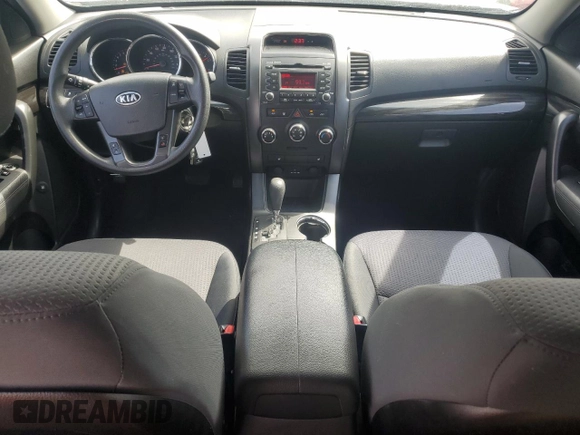 2012 Kia Sorento LX with VIN 5XYKT3A69CG306102, listed as a Copart auction lot 52996225 with 173,640 mi miles and Salvage Title. Bid and sale history available at carsss.com. Image 8.