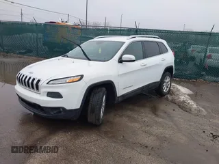 2016 Jeep Cherokee Latitude with VIN 1C4PJMCB3GW193834, listed as a IAAI auction lot 41675853 with 149,296 mi miles. Bid and sale history available at carsss.com. Image 2.