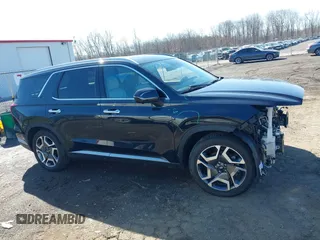 2024 Hyundai Palisade Limited z VIN KM8R5DGE1RU725867, wystawiony jako IAAI lot #41790529 z przebiegiem 33 869 mil mil oraz . Historia ofert i sprzedaży dostępna na DreamBid. Obrazek 13.