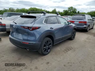 2022 Mazda CX-30 S Carbon Edition with VIN 3MVDMBCL7NM408036, listed as a Copart auction lot 56683665 with 82,337 mi miles and Salvage title. Bid and sale history available at DreamBid. Image 3.