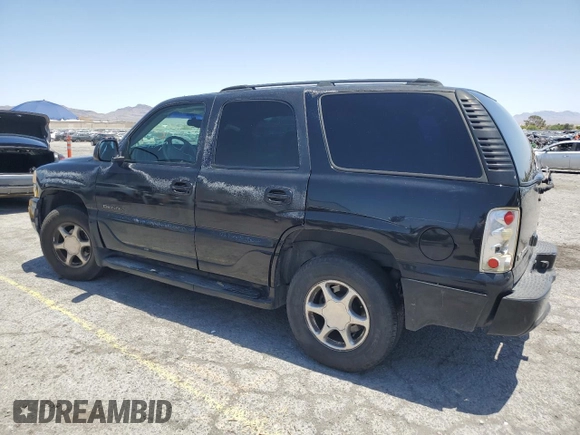 2002 GMC Yukon Denali z VIN 1GKEK63U62J241161, wystawiony jako Copart lot #58350085 z przebiegiem Nie podano mil oraz Szkoda całkowita • Salvage title. Historia ofert i sprzedaży dostępna na DreamBid. Obrazek 2.