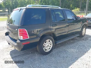 2003 Mercury Mountaineer Convenience z VIN 4M2DU86K43ZJ10878, wystawiony jako IAAI lot #42390874 z przebiegiem 194 867 mil mil oraz . Historia ofert i sprzedaży dostępna na DreamBid. Obrazek 4.