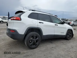2017 Jeep Cherokee Altitude with VIN 1C4PJLAB2HW573567, listed as a Copart auction lot 59630205 with 105,975 mi miles and Salvage title. Bid and sale history available at DreamBid. Image 3.