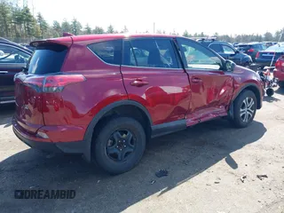 2018 Toyota RAV4 LE with VIN JTMBFREV2JD228186, listed as a IAAI auction lot 42076730 with 93,899 mi miles. Bid and sale history available at carsss.com. Image 4.