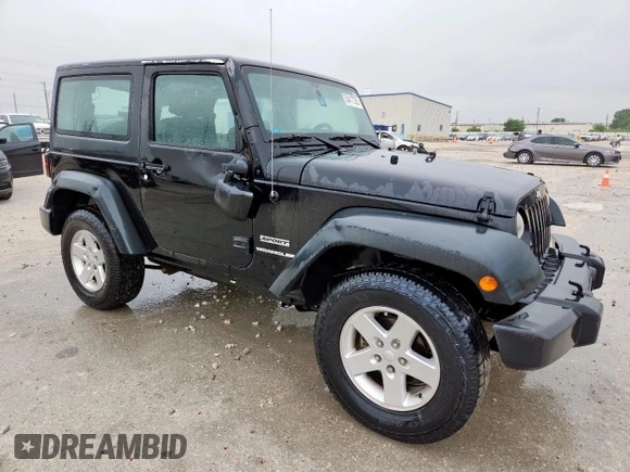 2014 Jeep Wrangler Sport with VIN 1C4AJWAG9EL261147, listed as a Copart auction lot 59417335 with 133,835 mi miles and Salvage title. Bid and sale history available at DreamBid. Image 4.