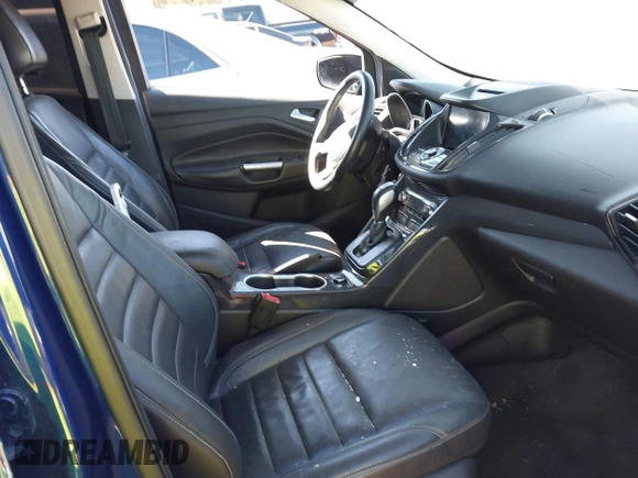 2016 Ford Escape Titanium with VIN 1FMCU0J95GUC41632, listed as a IAAI auction lot 41692040 with 144,834 mi miles. Bid and sale history available at carsss.com. Image 5.