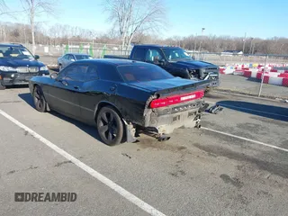 2013 Dodge Challenger R/T with VIN 2C3CDYBT6DH614418, listed as a IAAI auction lot 41583274 with 63,409 mi miles. Bid and sale history available at carsss.com. Image 3.