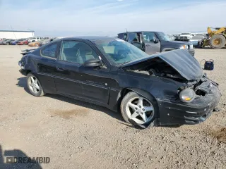2001 Pontiac Grand Am GT with VIN 1G2NW12E31M584119, listed as a Copart auction lot 76099984 with 293,559 mi miles and Clean Title. Bid and sale history available at carsss.com. Image 4.