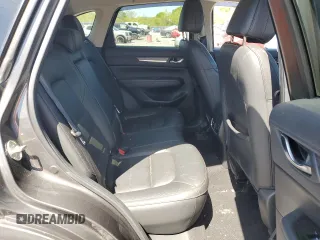 2018 Mazda CX-5 Grand Touring z VIN JM3KFBDM3J0351106, wystawiony jako Copart lot #52553925 z przebiegiem Nie podano mil oraz Szkoda całkowita • Salvage title. Historia ofert i sprzedaży dostępna na DreamBid. Obrazek 12.