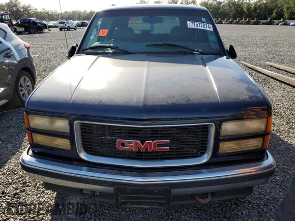 1998 GMC Yukon with VIN 1GKEK13R6WJ706204, listed as a Copart auction lot 77577074 with 186,023 mi miles and Salvage Title. Bid and sale history available at carsss.com. Image 5.