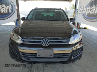 2013 Volkswagen Touareg Lux with VIN WVGEF9BPXDD001489, listed as a Copart auction lot 55898945 with 96,477 mi miles and Clean Title. Bid and sale history available at DreamBid. Image 5.