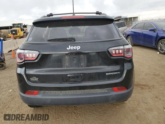 2017 Jeep Compass Sport z VIN 3C4NJCABXHT643474, wystawiony jako Copart lot #53654615 z przebiegiem 79 855 mil mil oraz Szkoda całkowita • Salvage title. Historia ofert i sprzedaży dostępna na DreamBid. Obrazek 6.