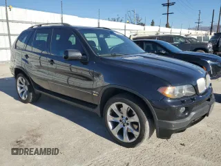 2005 BMW X5 4.8is with VIN 5UXFA93505LE83127, listed as a Copart auction lot 81653374 with 148,054 mi miles and Clean Title. Bid and sale history available at carsss.com. Image 4.