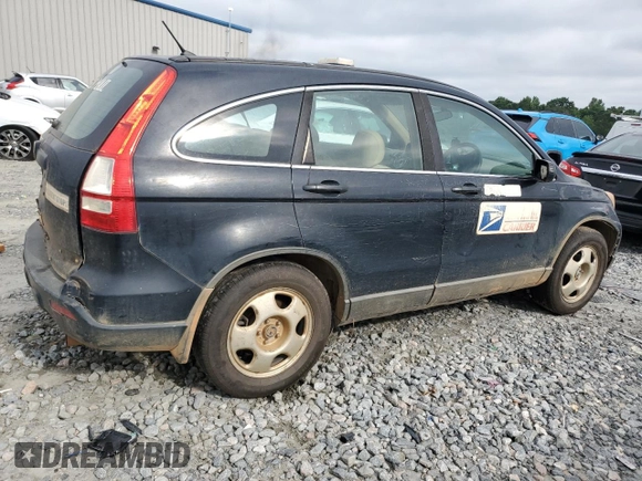 2009 Honda CR-V LX z VIN 5J6RE38309L015015, wystawiony jako Copart lot #56763035 z przebiegiem 211 946 mil mil oraz Szkoda całkowita • Salvage title. Historia ofert i sprzedaży dostępna na DreamBid. Obrazek 3.
