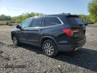 2019 Honda Pilot EX-L z VIN 5FNYF6H50KB097144, wystawiony jako Copart lot #56005005 z przebiegiem 123 056 mil mil oraz Szkoda całkowita • Salvage title. Historia ofert i sprzedaży dostępna na DreamBid. Obrazek 2.
