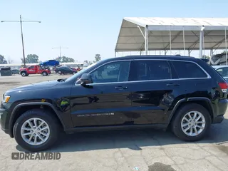 2022 Jeep Grand Cherokee Laredo X with VIN 1C4RJEAG7NC171377, listed as a IAAI auction lot 42592264 with 69,074 mi miles and . Bid and sale history available at DreamBid. Image 14.