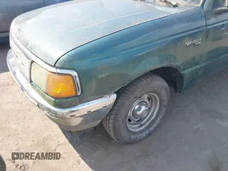 1996 Ford Ranger XL z VIN 1FTCR14U9TTA19168, wystawiony jako IAAI lot #42697495 z przebiegiem 300 792 mil mil oraz . Historia ofert i sprzedaży dostępna na DreamBid. Obrazek 6.
