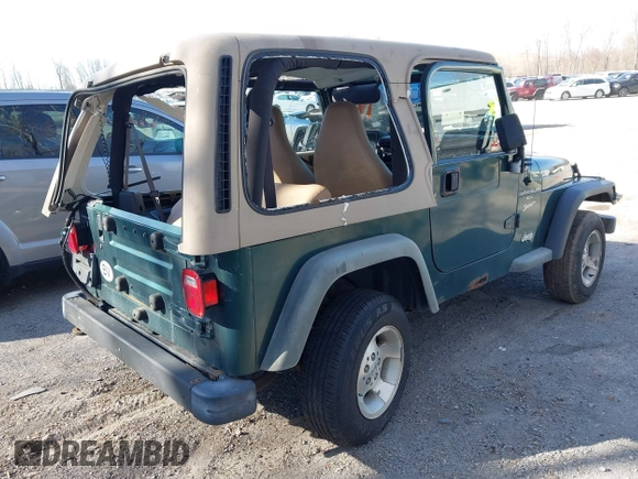2001 Jeep Wrangler Sport with VIN 1J4FA49S31P317597, listed as a IAAI auction lot 41839524 with 145,164 mi miles. Bid and sale history available at carsss.com. Image 4.