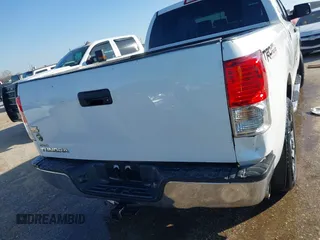 2013 Toyota Tundra z VIN 5TFRM5F14DX061244, wystawiony jako IAAI lot #41565473 z przebiegiem 253 238 mil mil oraz . Historia ofert i sprzedaży dostępna na DreamBid. Obrazek 16.