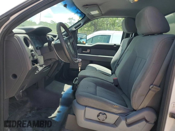 2013 Ford F-150 XL with VIN 1FTNF1CF5DKD70977, listed as a Copart auction lot 61922765 with 489,017 mi miles and Clean title. Bid and sale history available at DreamBid. Image 7.