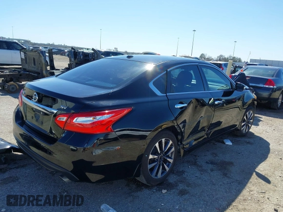 2016 Nissan Altima SV with VIN 1N4AL3AP1GC283029, listed as a IAAI auction lot 41715088 with 165,223 mi miles and . Bid and sale history available at DreamBid. Image 4.